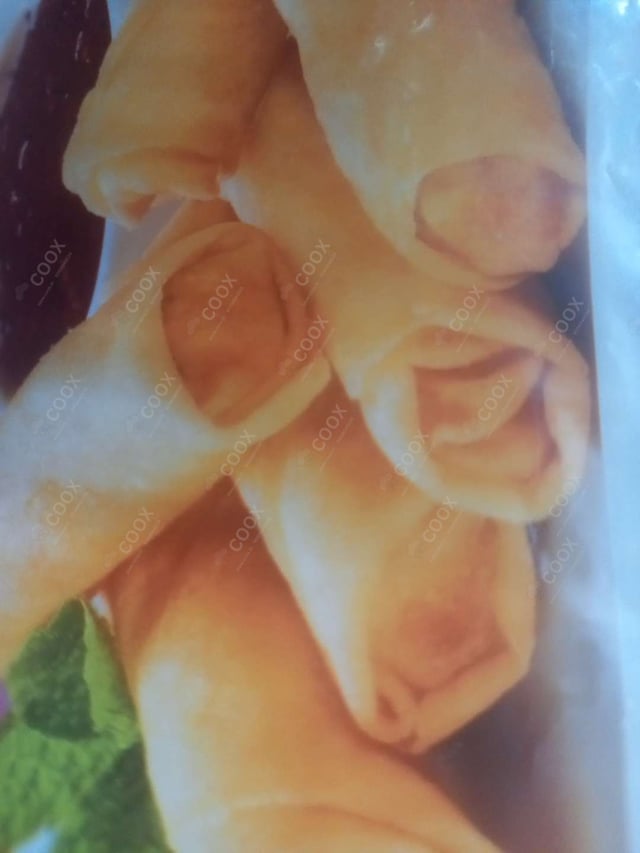 Delicious Veg Spring Rolls prepared by COOX