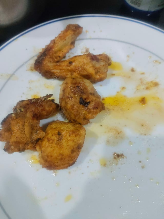 Delicious Tandoori Chicken prepared by COOX