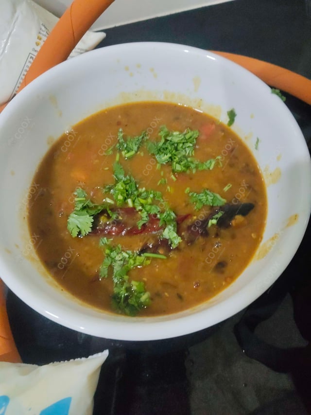 Delicious Dal Tadka prepared by COOX