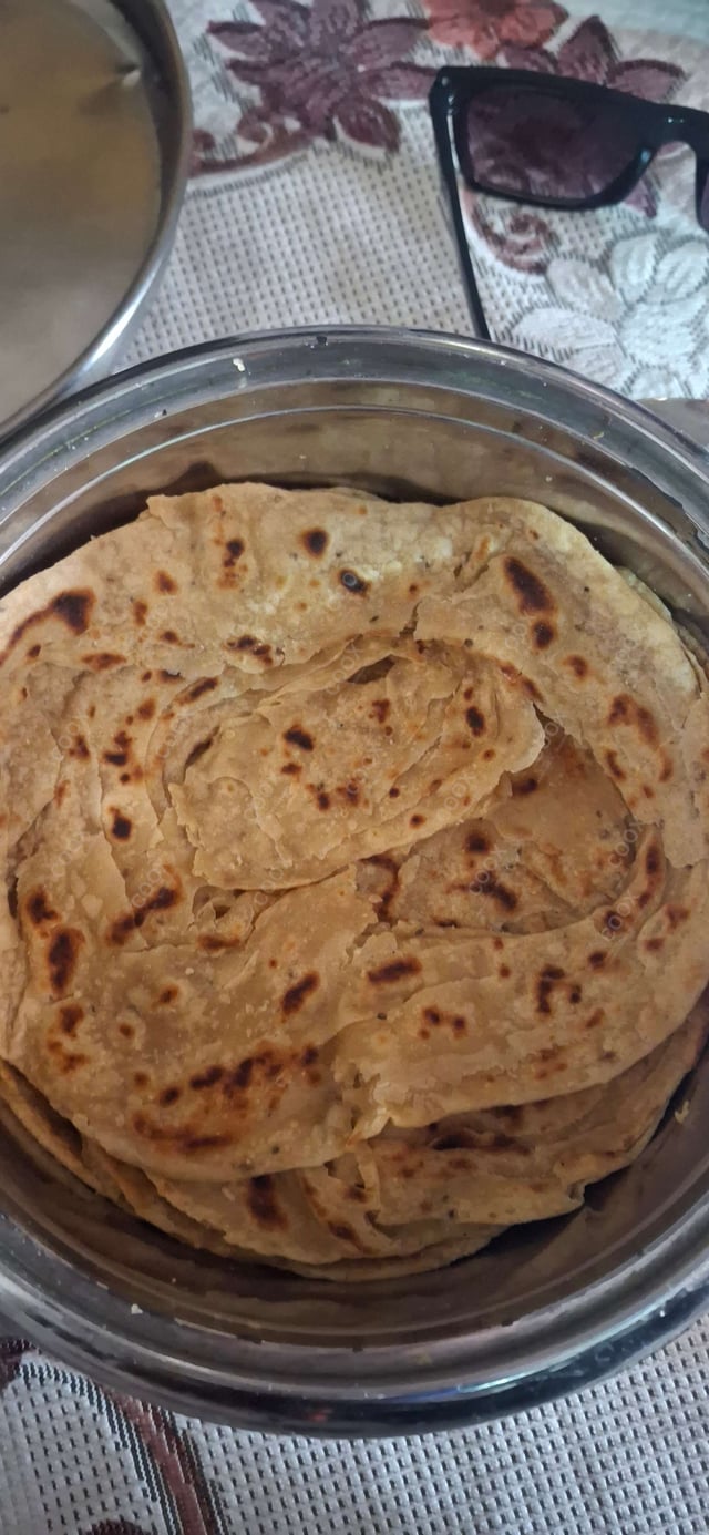 Delicious Lachha Paranthas prepared by COOX