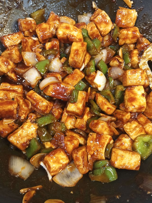 Delicious Chilli Paneer (Dry) prepared by COOX
