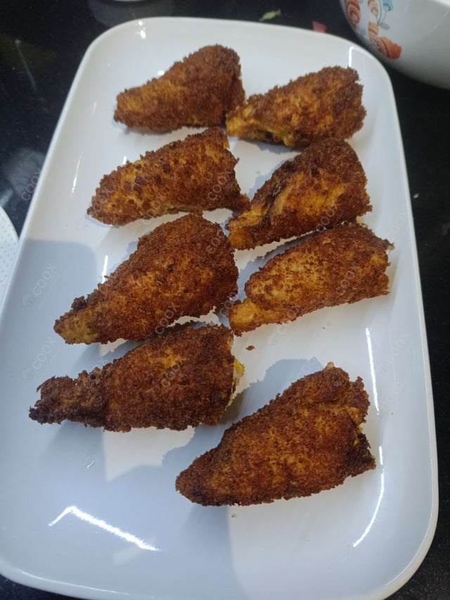 Delicious Dahi ke Sholey prepared by COOX