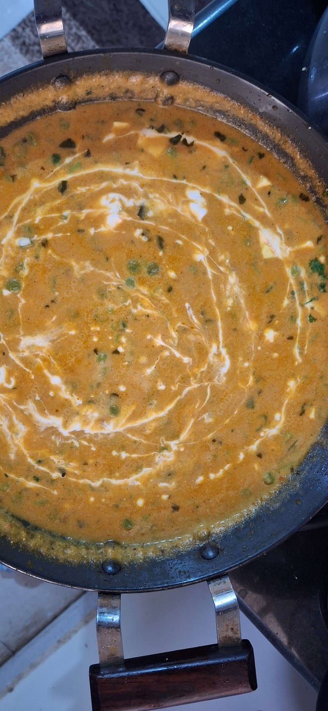 Delicious Matar Paneer prepared by COOX