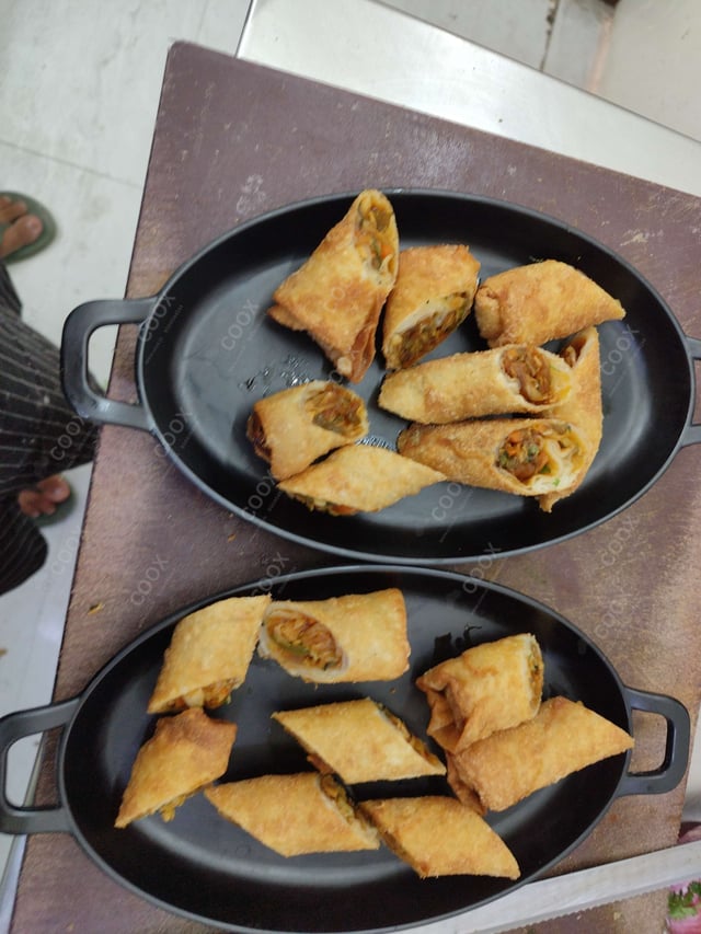 Delicious Veg Spring Rolls prepared by COOX