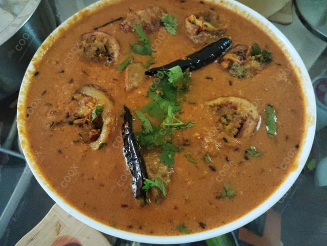 Delicious Stuffed Potatoes (Gravy) prepared by COOX