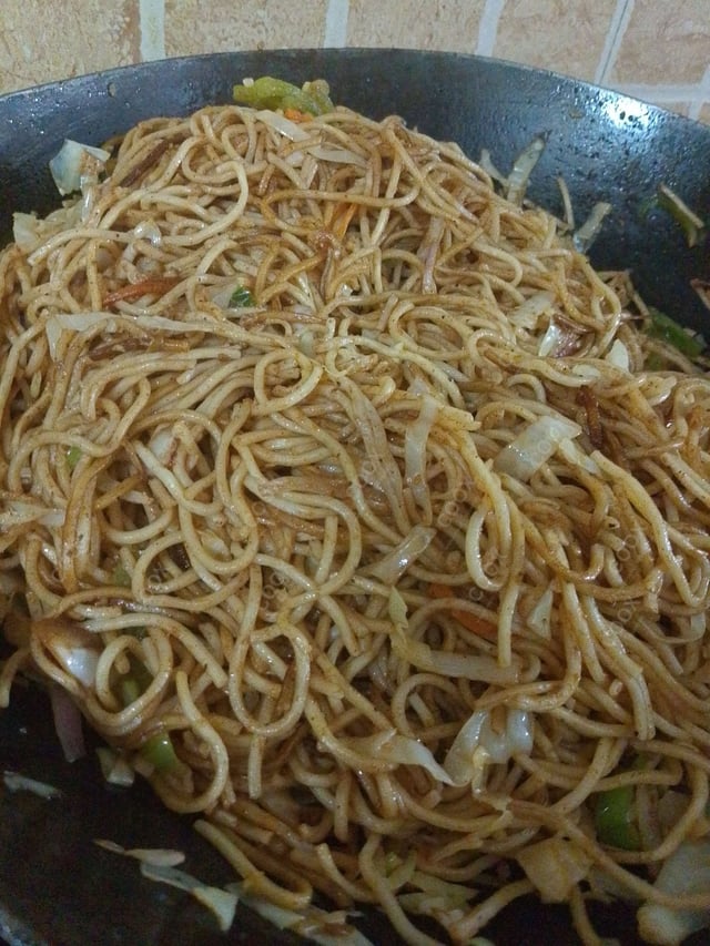 Delicious Veg Hakka Noodles prepared by COOX