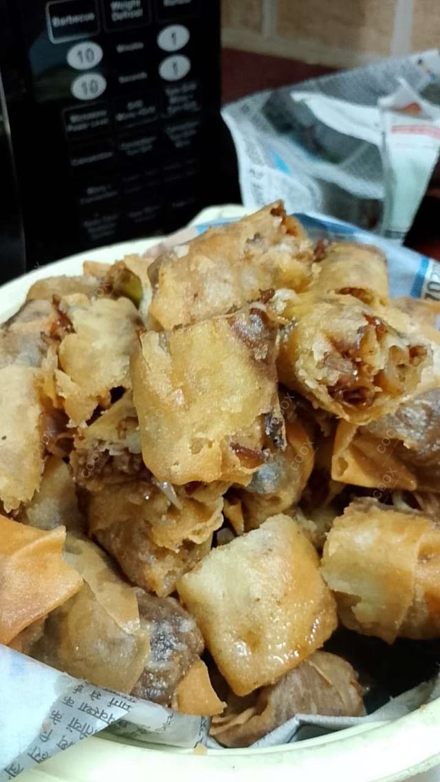 Delicious Veg Spring Rolls prepared by COOX