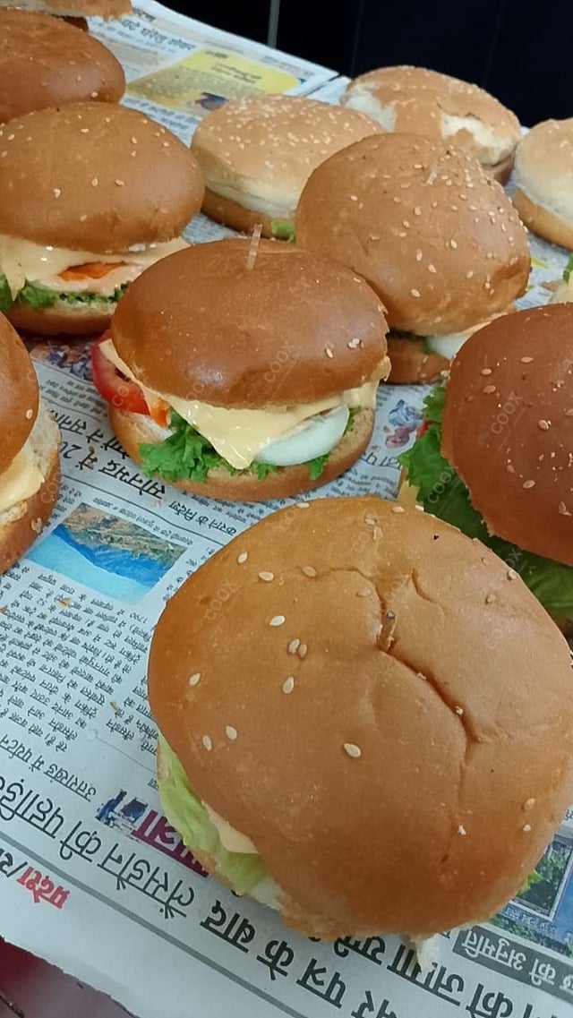 Delicious Mini Veg Burgers prepared by COOX