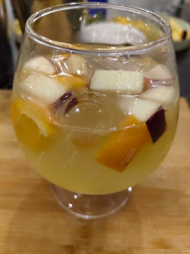 Delicious White Wine Sangria prepared by COOX