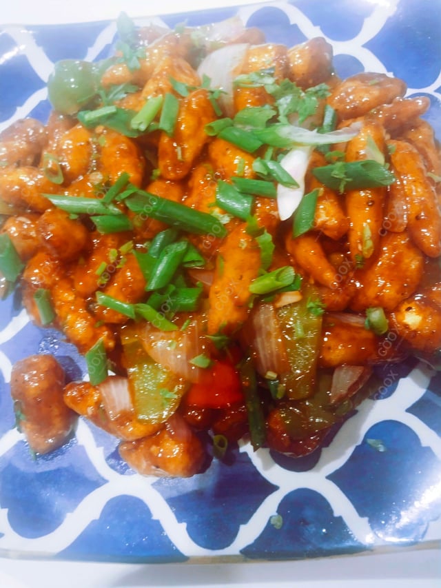 Delicious Crispy Chilli Baby Corn prepared by COOX