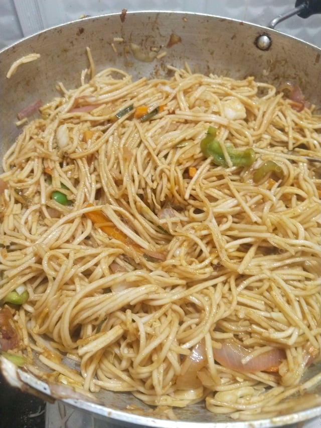 Delicious Veg Hakka Noodles prepared by COOX