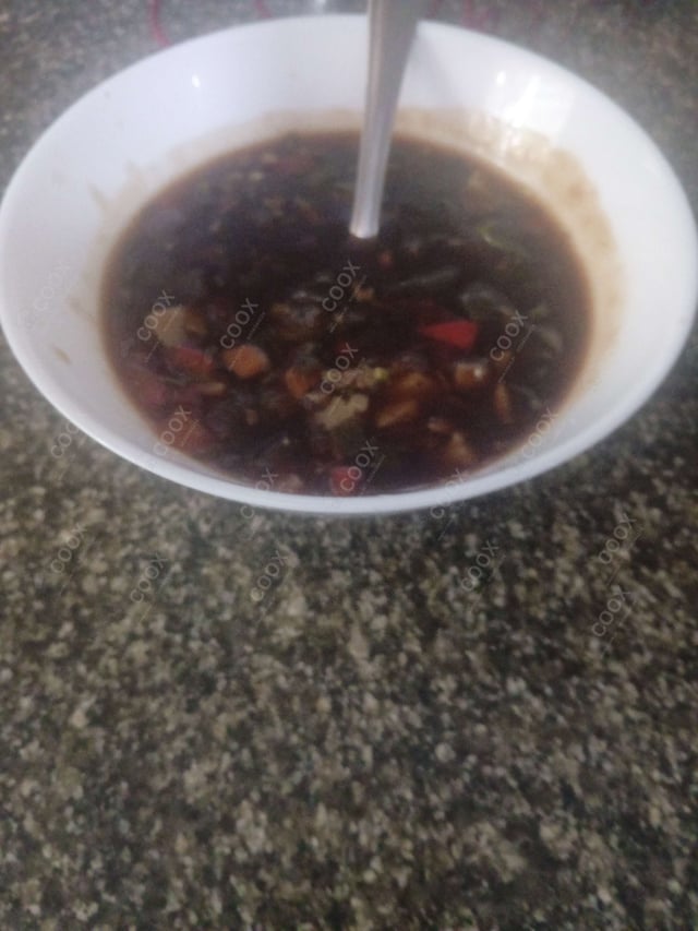 Delicious Vegetable Manchow Soup prepared by COOX