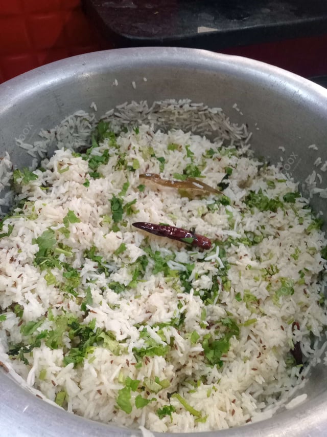 Delicious Jeera Rice prepared by COOX
