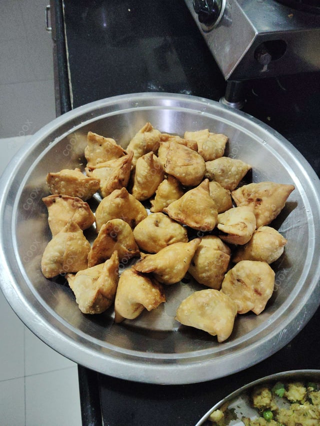 Delicious Mini Samosas prepared by COOX