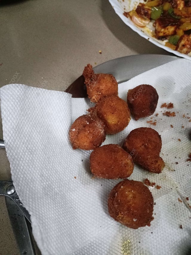 Delicious Fried Cheese Balls prepared by COOX
