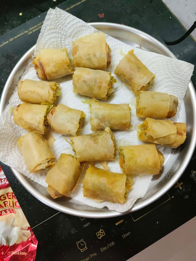 Delicious Veg Spring Rolls prepared by COOX
