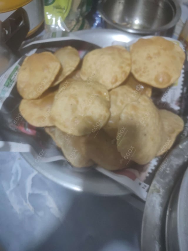 Delicious Pooris & Bedmis prepared by COOX