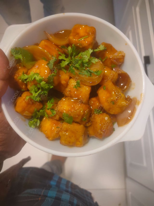 Delicious Chilli Paneer (Dry) prepared by COOX