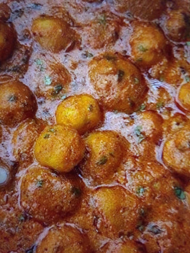 Delicious Dum Aloo prepared by COOX