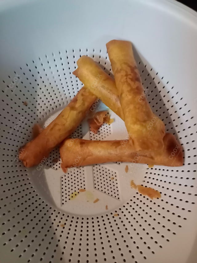 Delicious Veg Spring Rolls prepared by COOX