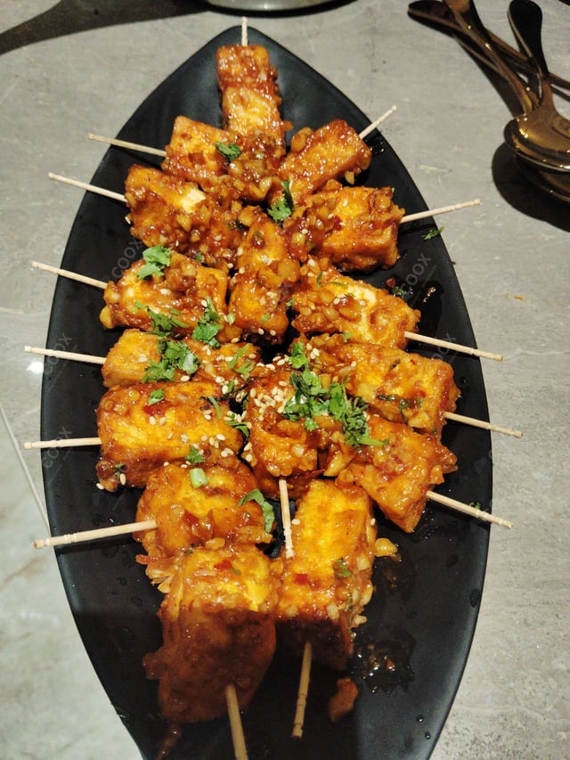 Delicious Thai Paneer Satay prepared by COOX