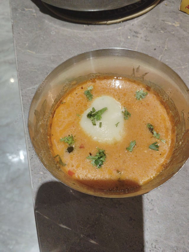 Delicious Ravioli in Pink Sauce prepared by COOX