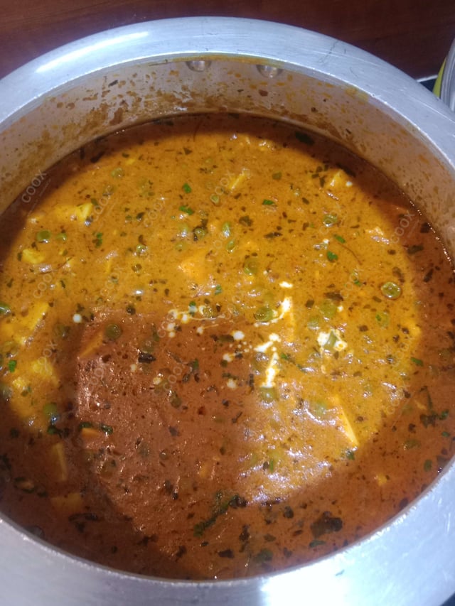 Delicious Matar Paneer prepared by COOX