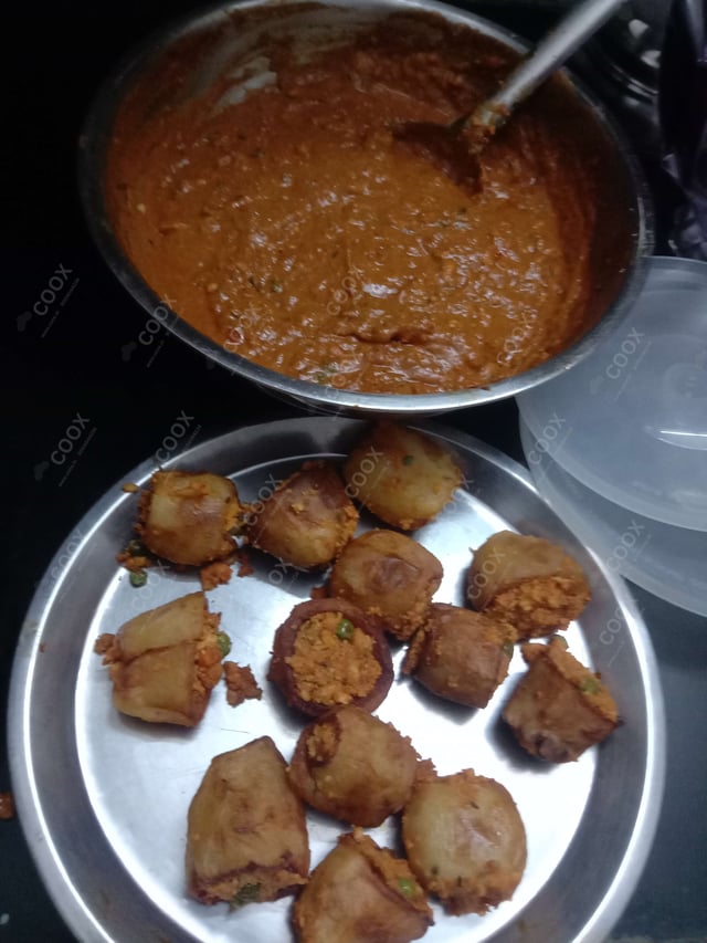 Delicious Stuffed Potatoes (Gravy) prepared by COOX