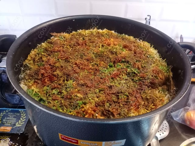 Delicious Chicken Biryani prepared by COOX