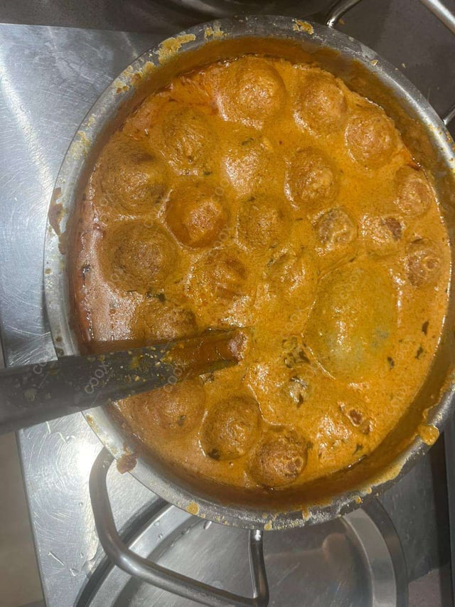 Delicious Malai Kofta (Orange Gravy) prepared by COOX