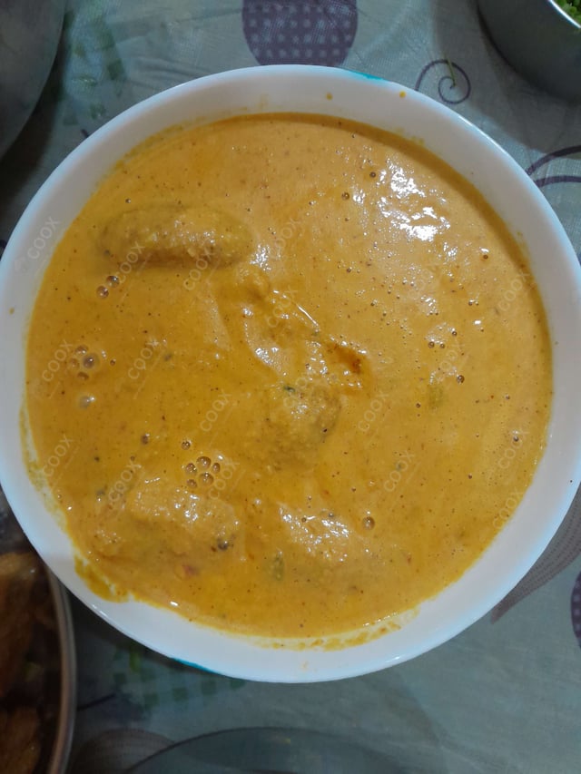 Delicious Malai Kofta (Orange Gravy) prepared by COOX