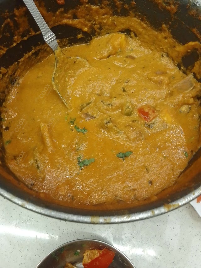 Tasty Malai Kofta (White Gravy) cooked by COOX chefs cooks during occasions parties events at home