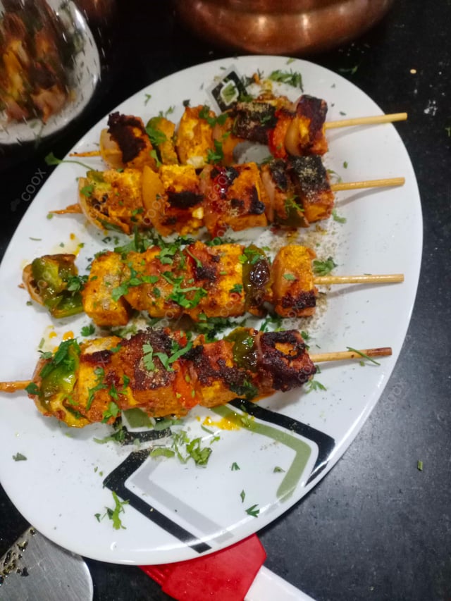 Delicious Paneer Tikka prepared by COOX