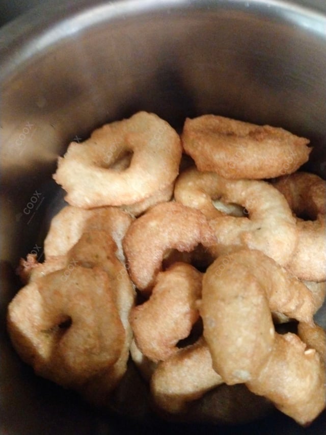 Tasty Medu Vada cooked by COOX chefs cooks during occasions parties events at home