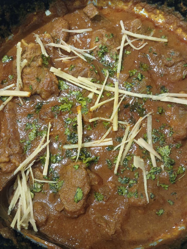 Delicious Chicken In Burnt Garlic Sauce prepared by COOX