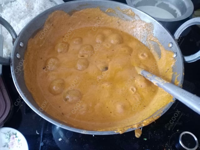 Delicious Malai Kofta (Orange Gravy) prepared by COOX