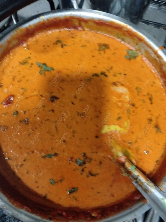 Delicious Butter Chicken prepared by COOX