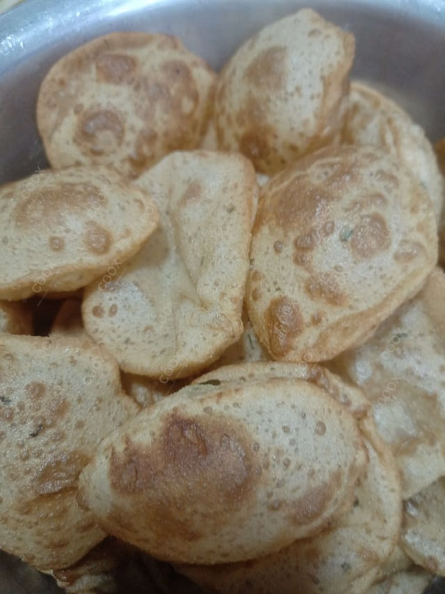 Delicious Pooris & Bedmis prepared by COOX