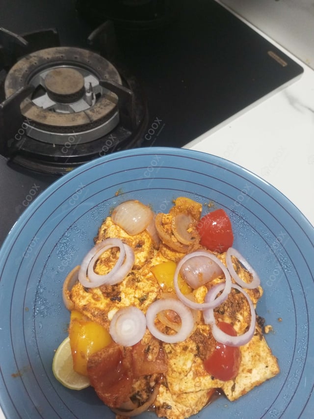 Delicious Paneer Tikka prepared by COOX