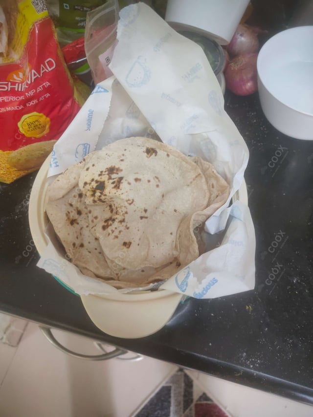 Delicious Tawa Rotis prepared by COOX