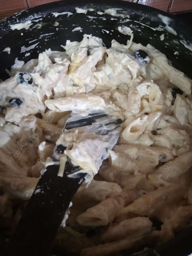 Tasty Chicken Pasta in White Sauce cooked by COOX chefs cooks during occasions parties events at home