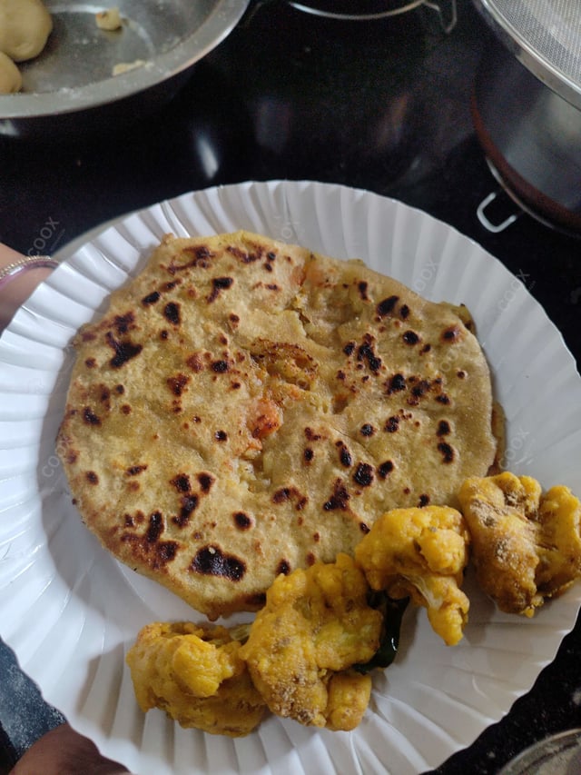 Delicious Stuffed Paranthas prepared by COOX