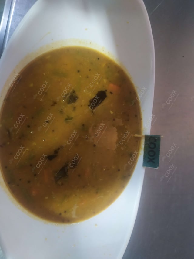Tasty Sambhar cooked by COOX chefs cooks during occasions parties events at home