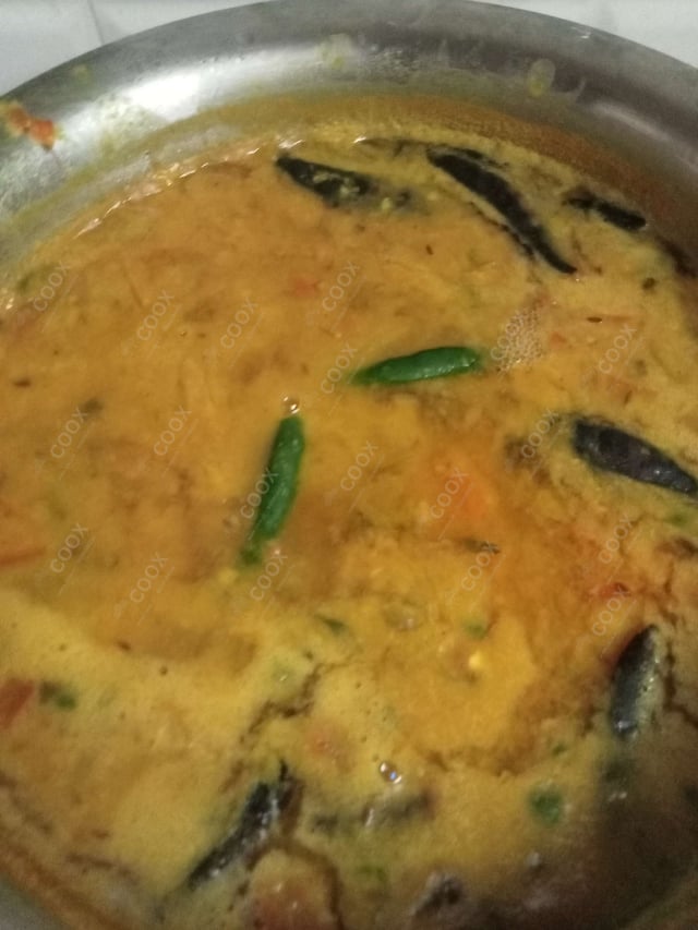 Delicious Dal Tadka prepared by COOX