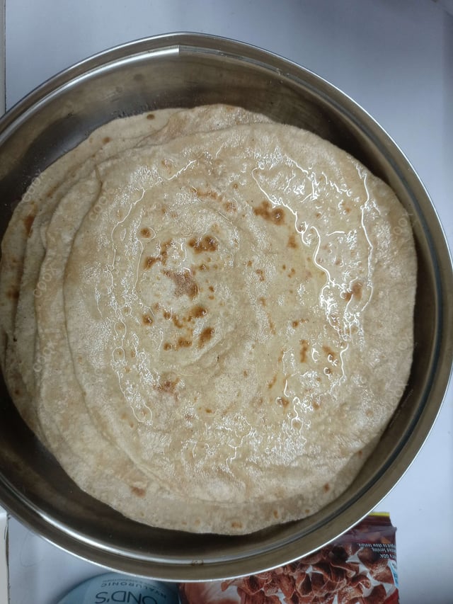 Delicious Tawa Rotis prepared by COOX