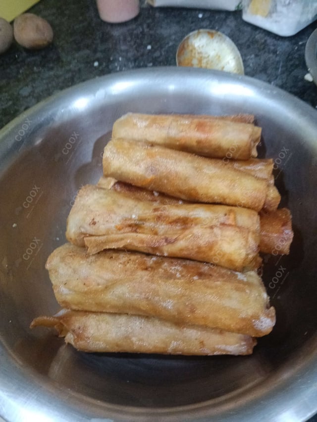 Delicious Chicken Spring Rolls prepared by COOX