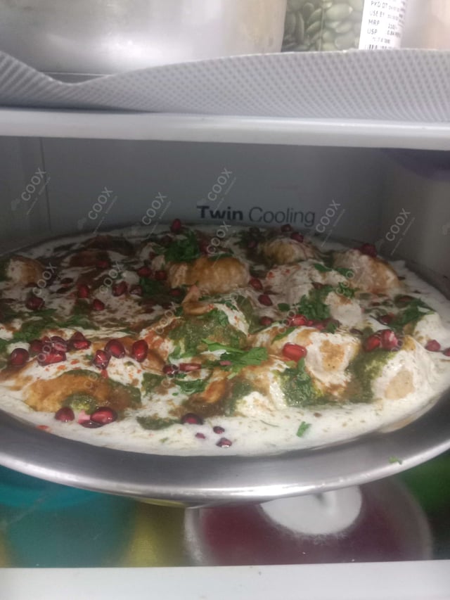 Tasty Dahi Vada cooked by COOX chefs cooks during occasions parties events at home