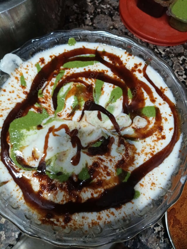 Delicious Dahi Bhalla prepared by COOX