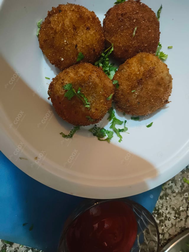 Delicious Veg Cutlets prepared by COOX