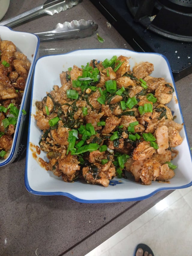 Tasty Thai Basil Chicken cooked by COOX chefs cooks during occasions parties events at home